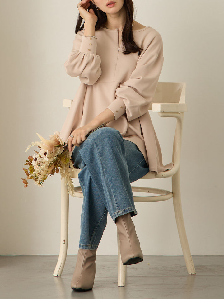 粉米色荷叶边上衣