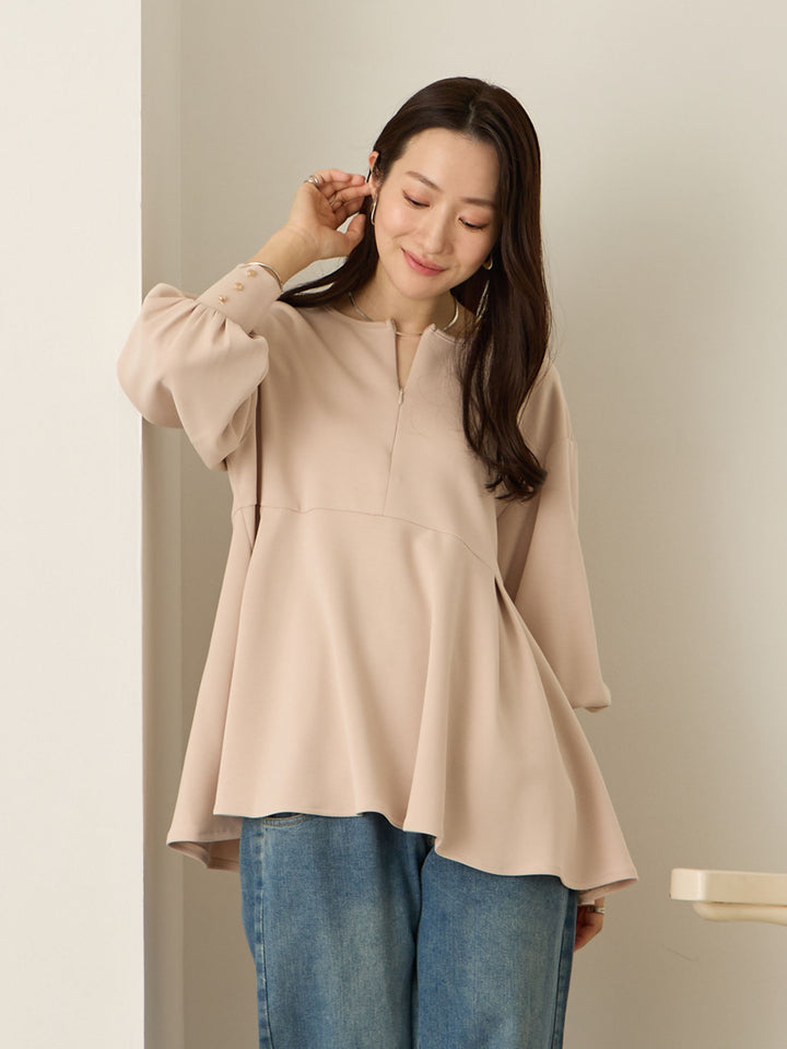 粉米色荷叶边上衣