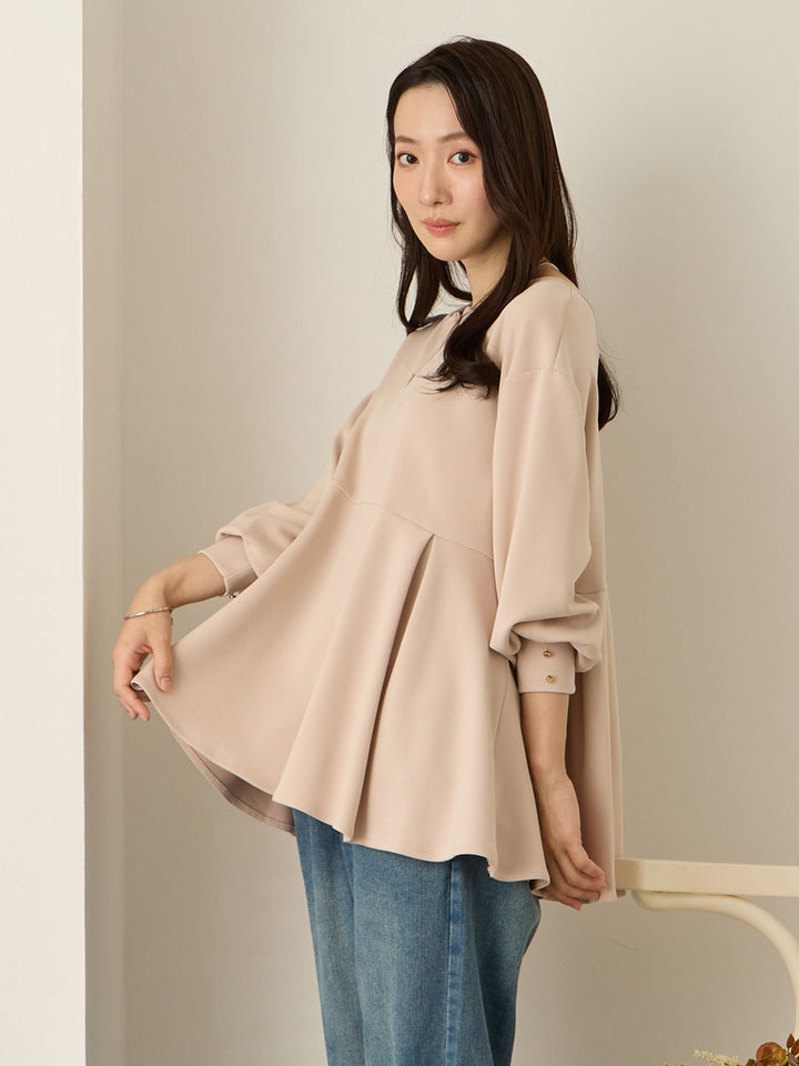 粉米色荷叶边上衣