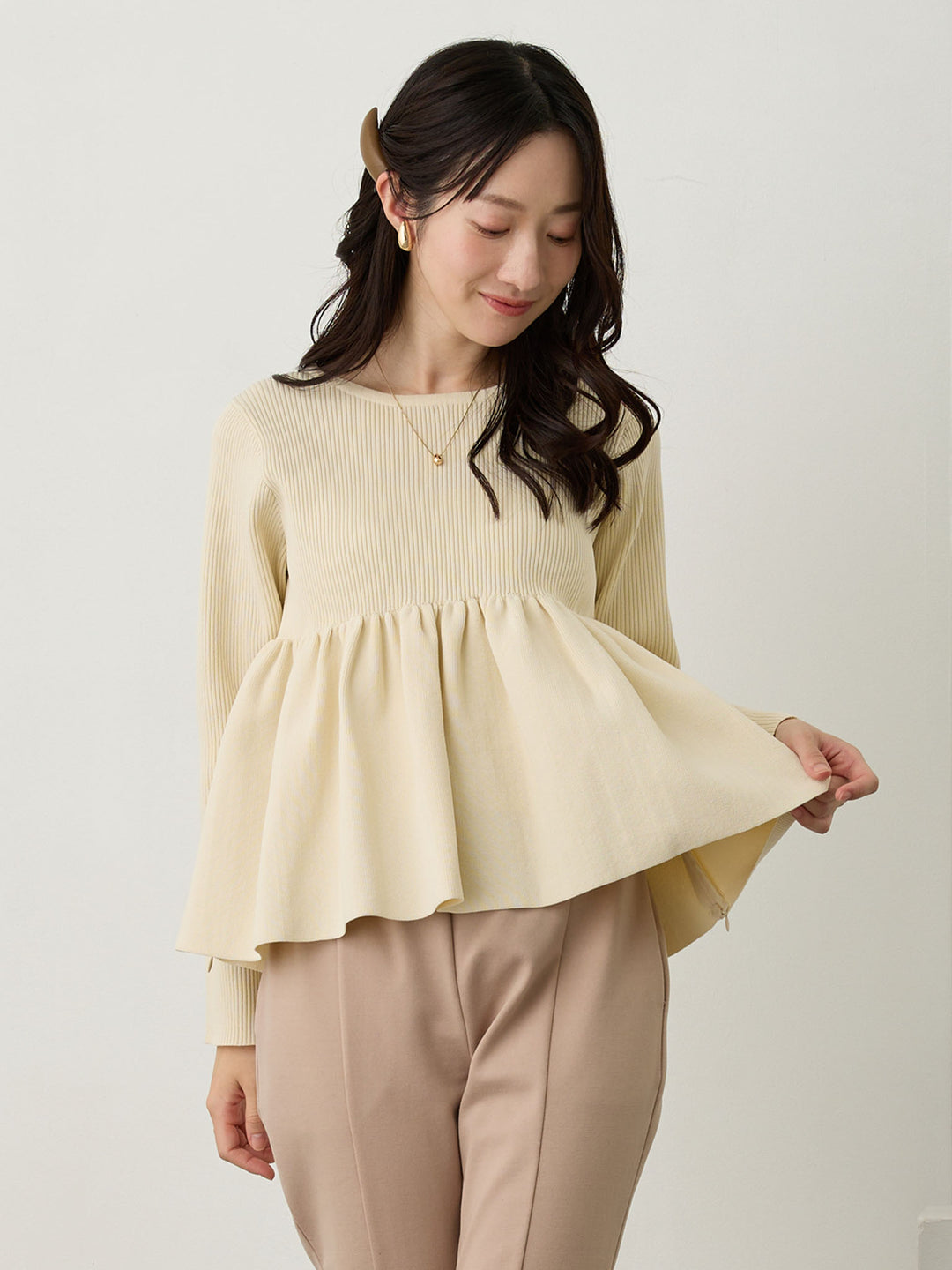 ペプラムニットトップス Ivory