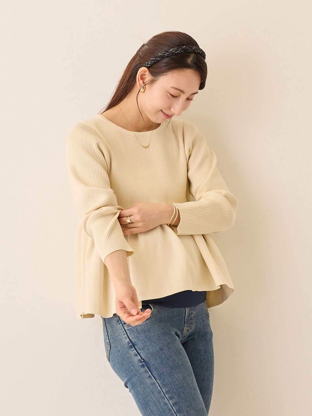 ペプラムニットトップス Ivory