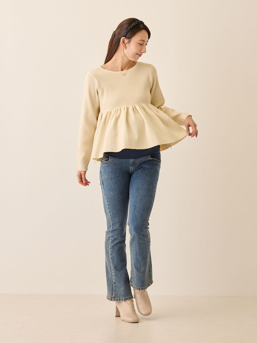 ペプラムニットトップス Ivory