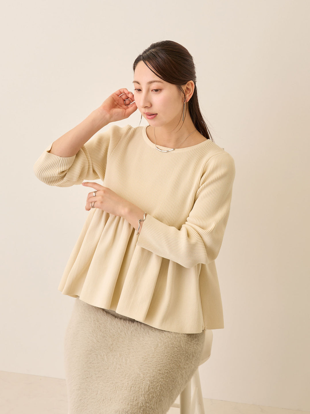 ペプラムニットトップス Ivory