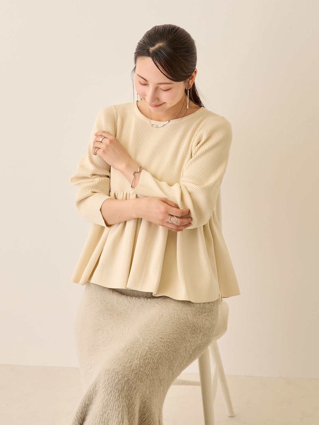 ペプラムニットトップス Ivory