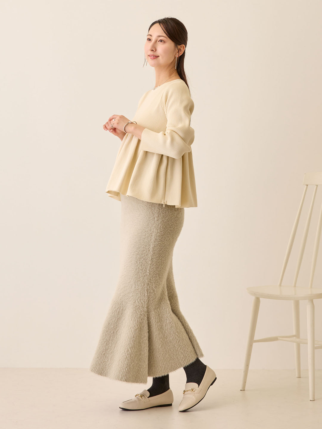 ペプラムニットトップス Ivory