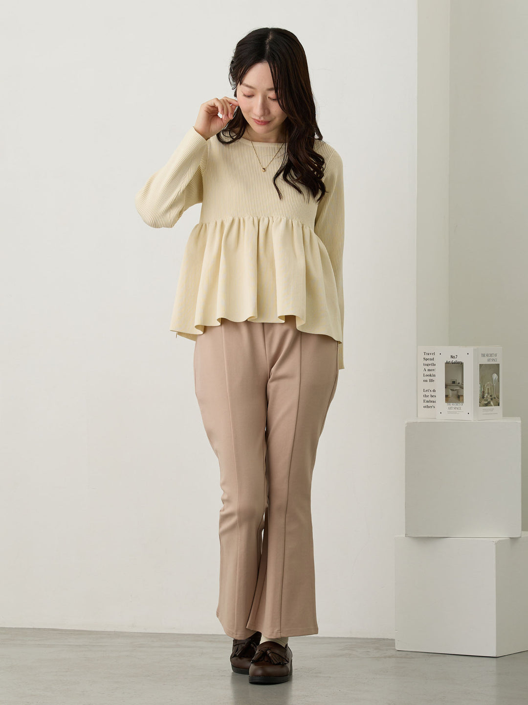 ペプラムニットトップス Ivory